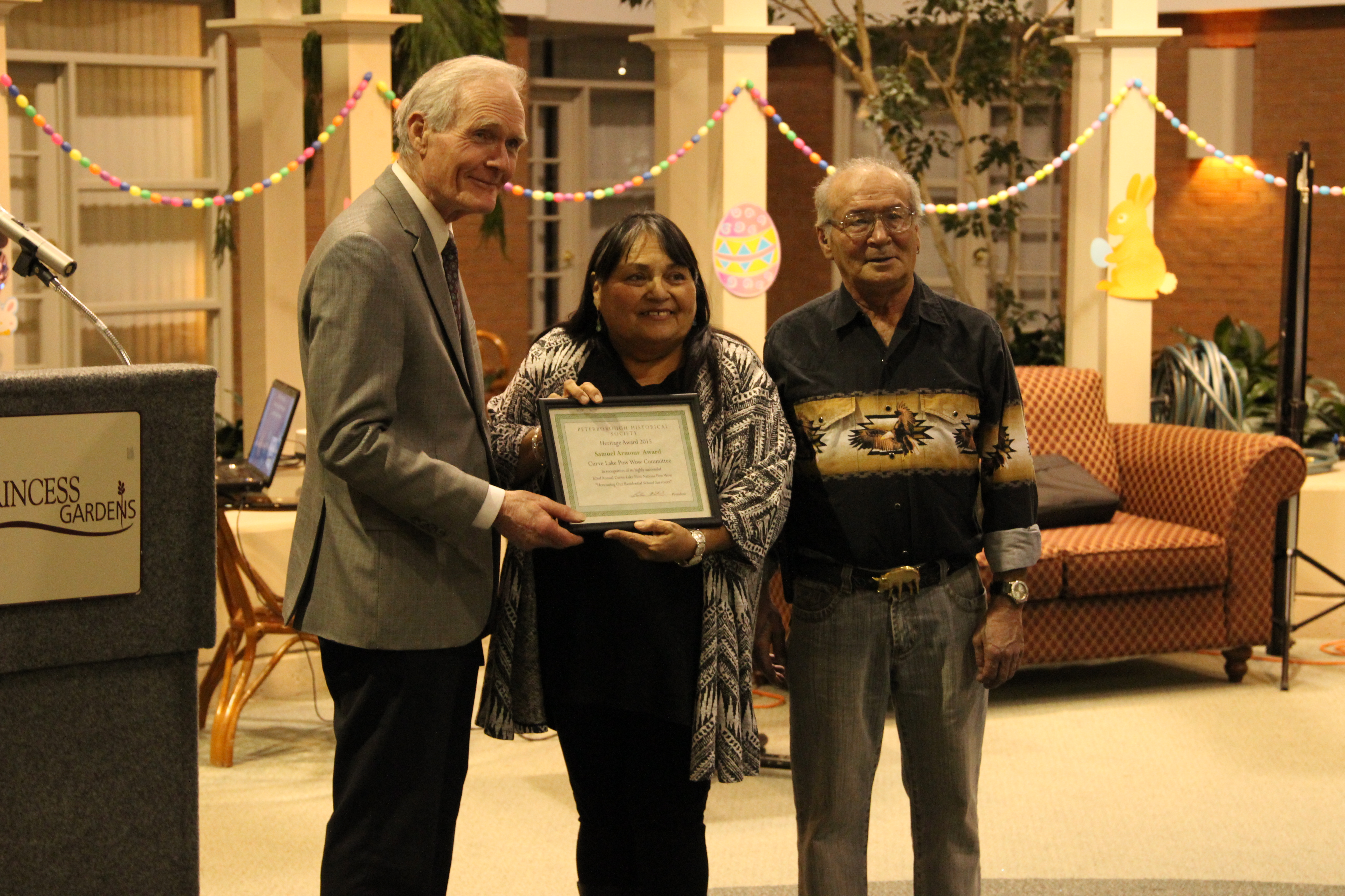 Graham Hart presenting the Samuel Armour Award to the Curve Lake Pow Wow Committee in recognition of its successful 62nd Annual Curve Lake First Nations Pow Wow held in September 2015.